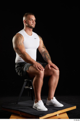 Whole Body Man White Sports Shorts Muscular Sitting Top Studio photo references